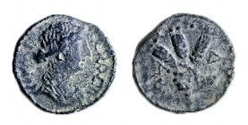 HEROD PHILIP, 4 BCE – 34 CE Bronze, 15.1 mm. Obverse: Bust of Livia to r, ΙΟΥΛΙΑ CΕΒΑCΤΗ. Reverse: Hand holds 3 ears of grains, KAPΠOΦOPOC LΛΔ (Year 3...