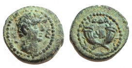 GADARA, TIBERIUS, 14 – 37 CE Bronze, 15.1 mm. Obverse: Bust of Tiberius to r. TIBE RIW. Reverse: Two cornucopiae. GADA, year 92 (28/9 CE). Extremely F...