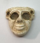 SUMERIAN WHITE STONE MASK PENDANT Early 3rd millennium BCE. 2.2 cm high. Sliding perforated. In very good condition. Ex Shlomo Moussaieff collection, ...