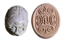 A WHITE STONE SCARAB SEAL 13th century BCE. 15.8x11.7x7.7 mm. Lengthwise perforated. The beetle is carved realistically in three dimensions with a hum...