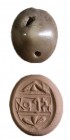 A SOUTH-ARABIAN STONE SEAL Iron Age II, 7th-6th century BCE. 18.8x14.9x10.1 mm. Lengthwise perforated. The inscription reads: ʾlʾt “ʾElʾat”. In very g...