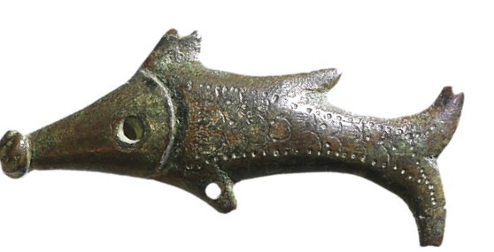 A BRONZE FISH Byzantine Period, 4th-5th century CE. 6.1 cm long. With nice brown...