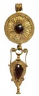 A HELLENISTIC GOLD PENDANT 3rd-2nd century BCE. 3.14 gr., 5.8 cm high. Inlayed with two garnets. In very good condition. Ex auction no. 53, October 20...