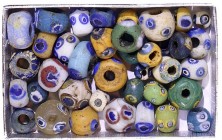A LOT OF 39 GLASS EYE BEADS Hellenistic and Roman, 4th century BCE – 4th century CE. In very good condition. Ex Jacob Levy collection, Tel Aviv.