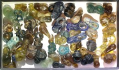 A LOT OF 60 GLASS PENDANT-BEADS Byzantine Period, 4th-6th century CE. In very good condition. Ex Jacob Levi collection, Tel Aviv.