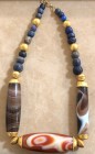 A LAPIS LAZULI AND GOLD BEADS NECKLACE WITH 3 HUGE AGATE BEADS Persian Period, 6th-5th century BCE. 48 cm long. In very good condition and rare.