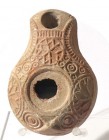 A SAMARITAN TERRACOTTA OIL LAMP 4th century CE. 9.1 cm. Decorated with geometric motifs. In very good condition. Ex Judge Steve Adler collection, Jeru...