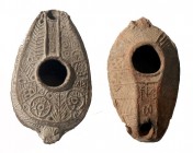 A LOT OF TWO TERRACOTTA OIL LAMPS Late Samaritan Period, 7th-8th century CE. 10.5 and 9.8 cm. In very good condition. Ex Judge Steve Adler collection,...
