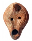 A JEWISH NORTH AFRICAN TERRACOTTA OIL LAMP DEPICTING A MONORAH 5th century CE. 9.5 cm. Base mended but in good condition.