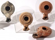A LOT OF 4 TERRACOTTA OIL LAMPS One Hellenistic and 3 Herodian. In very good condition.