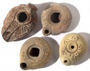 A LOT OF 4 TERRACOTTA OIL LAMPS 3 Roman and one Islamic, 1st-8th century CE. In very good condition. Ex Amiram Aharonowitz collection, Holon.