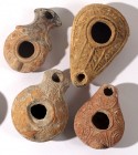 A LOT OF 4 TERRACOTTA OIL LAMPS One Roman, one Samaritan and 2 Byzantine, 2nd - 6th century CE. In very good condition. Ex Shlomo Moussaieff collectio...