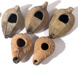 A LOT OF 5 TERRACOTTA OIL LAMPS Byzantine and Early Islamic Period, 6th-8th century CE. Decorated with geometric and floral motifs. In very good condi...