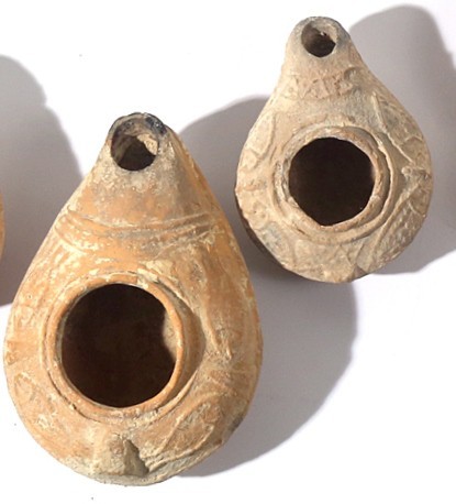 A LOT OF 2 CLAY OIL LAMPS WITH FISH 2nd-3rd century CE. 9.7, 7.2 cm. In good con...