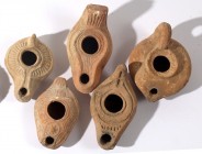 A LOT OF 5 TERRACOTTA OIL LAMPS Byzantine Period, 4th-7th century CE. In very good condition. Ex Yoav Sasson collection, Jerusalem.