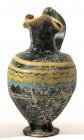 A SAND-CORE GLASS OINOCHOE 6th-5th century BCE. 9.4 cm high. Minor base damage repaired but in very good condition. Ex Abraham Rosen collection, New Y...