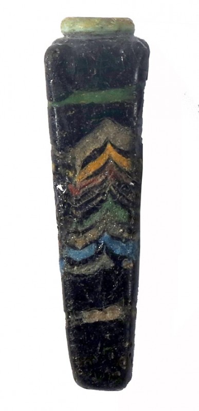 A BLACK WITH BLUE AND YELLOW GLASS KOHL TUBE Achaemenid, 5th-4th century BCE. 7....