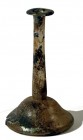 A GLASS BOTTLE WITH A WIDE BODY Roman Period, 1st-2nd century CE. 17.5 cm high. In very good condition. Ex David Bergman collection, Haifa.