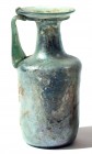 A CYLINDRICAL GLASS BOTTLE Late Roman Period, 4th century CE. 16.8 cm high. With nice internal silver patina and in very good condition. Ex Yoav Sasso...