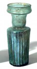 A GLASS PERFUME BOTTLE Roman Period, 1st-2nd century CE. 14.8 cm high. In very good condition. Ex David Bergman collection, Haifa.