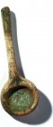 A COSMETIC GLASS SPOON Byzantine Period, 5th-6th century CE. 11.4 cm high. With nice silver patina and in very good condition. Ex Yoav Sasson collecti...