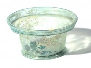 A GLASS BOWL Late Roman-Byzantine Period, 4th-5th century CE. 5.4 cm high, 10.3 cm in diam. In very good condition. Ex Yoav Sasson collection, Jerusal...