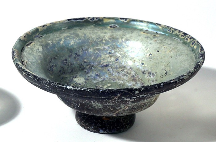 A GLASS BOWL Late Roman-Byzantine Period, 4th-5th century CE. 6.2 cm high, 15.4 ...