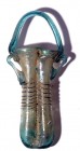 A LIGHT GREEN GLASS COSMETIC DOUBLE UNGUENTARIA Byzantine Period, 5th-6th century CE. 15.7 cm high, with the basket handle. In very good condition. Ex...