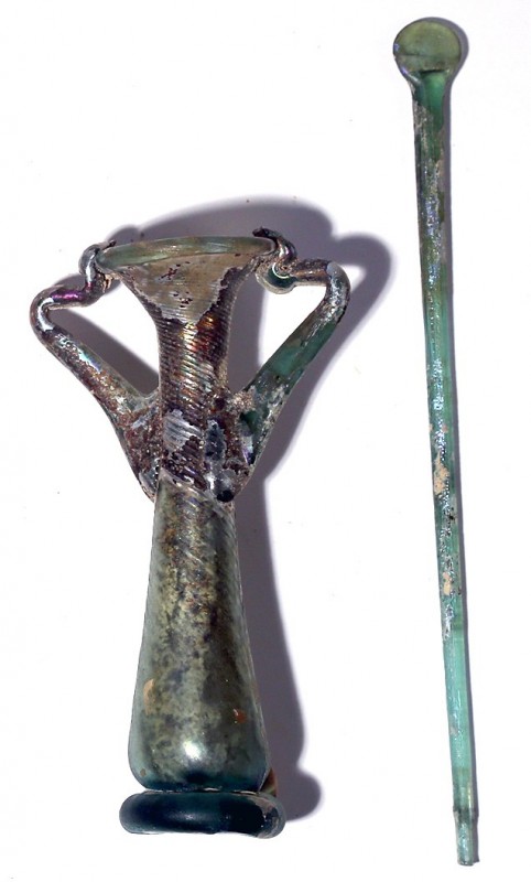 A GLASS DOUBLE UNGUENTARIA Byzantine Period, 5th-6th century CE. 11.9 cm high. C...