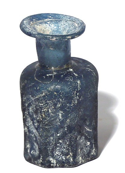 A MOLD-BLOWN BLUE GLASS JAR Byzantine Period, 5th-6th century CE. 8.8 cm high. O...