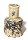 AN OCTAGONAL GLASS JAR Islamic Period, 7th-9th century CE. 9.1 cm high. With nice white patina and in very good condition. Ex Angelo Piattelli coll., ...