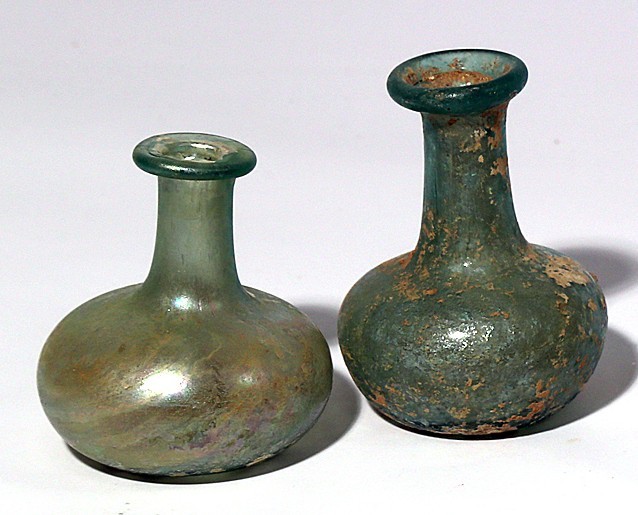 A LOT OF 2 GLASS BOTTLES Byzantine Period, 4th-5th century CE. 8.4-7.0 cm high. ...