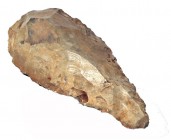 A PREHISTORIC STONE HAND-AXE Paleolithic Period, ca. 300-200,000 years Before Present. 19 cm high. In very good condition.