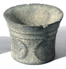 A SMALL BASALT BOWL WITH ROPE DECORATION Chalcolithic Period, 4th millennium BCE. 11.0 cm in diameter, 7.9 cm high. With minor rim chips but in very g...
