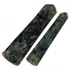 A LOT OF 2 FLAT BRONZE AXES Early Bronze Age, 3100 – 2900 BCE. 21.3-18.5 cm long. In very good condition. Ex Lisa Knothe collection, Jerusalem.