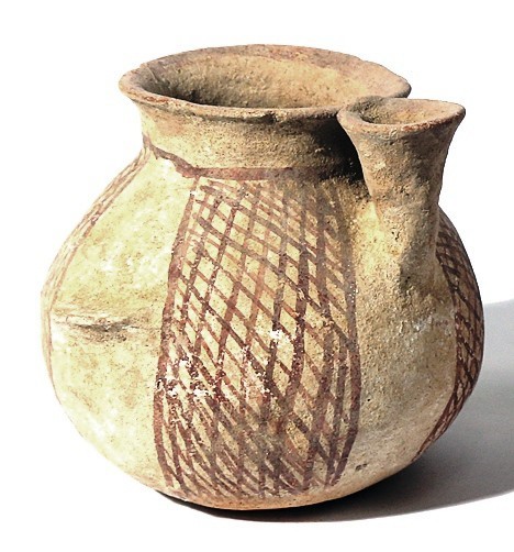 A TERRACOTTA JAR WITH CUP Early Bronze Age, 3100 – 2900 BCE. 10.6 cm high. Decor...