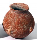 A RED SLIP TERRACOTTA JAR Early Bronze Age, 3100 – 2900 BCE. 11.8 cm high. With 4 small pierced handles. In very good condition. Ex David Bergman coll...