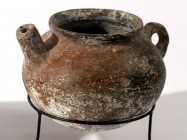 A BROWN TERRACOTTA TEAPOT Middle Bronze Age, 1730 – 1550 BCE. 13.5 cm in diameter. In very good condition. Ex David Bergman collection, Haifa.