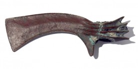 A BRONZE AXE WITH SPIKES Early 2nd millennium BCE. 17.5 cm long. With nice brown patina (found in the sea). In very good condition. Ex Yoel Kish, coll...