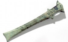 A CANAANITE BRONZE PIERCING AXE Middle Bronze Age, 17th-16th century BCE. 16.0 cm long. With very nice green patina. In very good condition. Ex Yoel K...