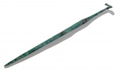 A CANAANITE BRONZE SPEAR TERMINAL Middle Bronze Age, 1730 – 1550 BCE. 27.6 cm. With nice green patina. In very good condition.