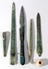 5 CANAANITE BRONZE WEAPONS Middle Bronze Age, 1830 – 1550 BCE. Including two dagger blades, a spear-head and its terminal, a piercing axe and a stone ...