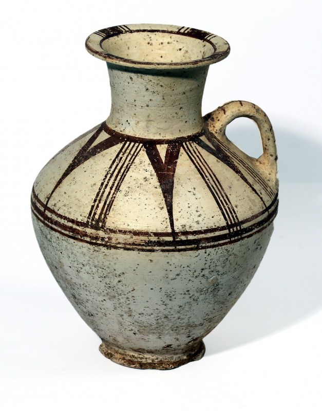 A CANAANITE CHOCOLATE ON WHITE TERRACOTTA JUG Late Bronze Age 16th-15th century....