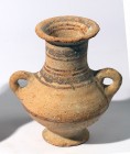 CANAANITE TERRACOTTA AMPHORISKOS Late Bronze Age, 1550 – 1200 BCE. 16.5 cm high. With brown linear decorations. In good condition. Ex David Bergman co...