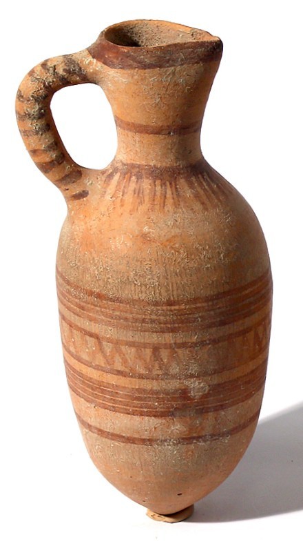A CANAANITE TERRACOTTA JUGLET Late Bronze Age, 1550 – 1200 BCE. 18.5 cm high. Wi...