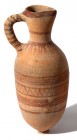 A CANAANITE TERRACOTTA JUGLET Late Bronze Age, 1550 – 1200 BCE. 18.5 cm high. With nice linear brown decorations. In very good condition. Ex David Ber...