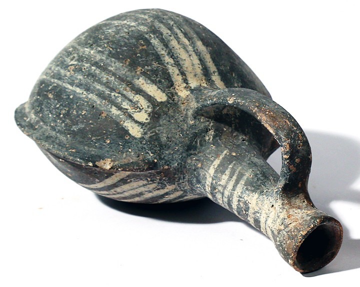 A CYPRIOT TERRACOTTA FLASK Late Bronze Age, 1550 – 1200 BCE. 18.5 cm high. In ve...