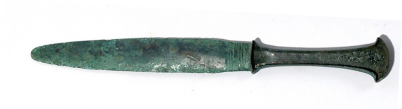 A CANAANITE BRONZE DAGGER Late Bronze Age, 16th – 13th century BCE. 28.4 cm long...