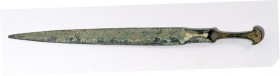 A LURISTAN BRONZE DAGGER Iron Age, 12th-8th century BCE. 29.5 cm long. In very good condition. Ex Aka Mizrahi collection, Tiberias.