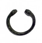 A BRONZE BRACELET WITH TWO SERPENT HEAD TERMINALS Iron Age, 8th century BCE. 6.7 cm in diameter. With very nice green patina and in very good conditio...